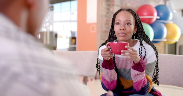 Relaxed Woman Enjoying Coffee in Modern Cafe - Download Free Stock Images Pikwizard.com