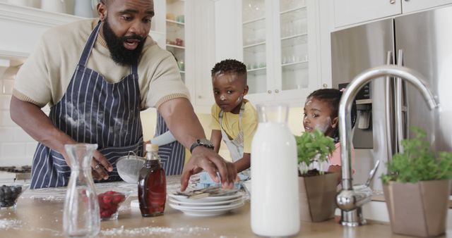 Father Cooking Breakfast with Children in Kitchen - Download Free Stock Images Pikwizard.com