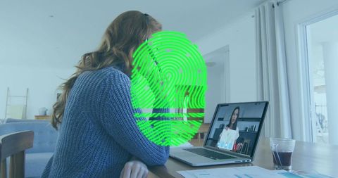 Woman engaging in video call at home office setup