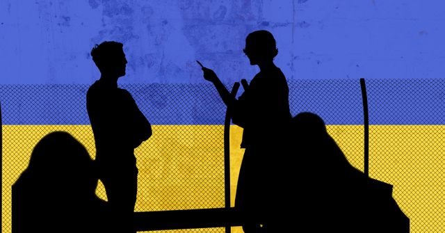 Silhouette of group of people and barbed wire fence against ukraine background - Download Free Stock Photos Pikwizard.com