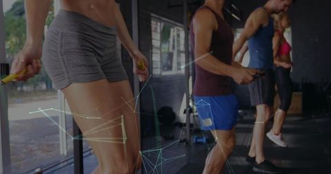 High-energy group skipping rope cardio workout featuring female skipper leading circuit