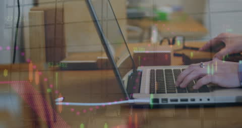 Hands Typing on Laptop with Overlapping Stock Market Data Chart