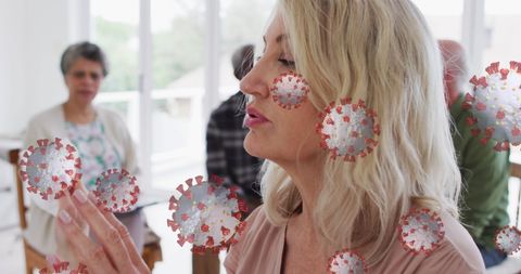 Woman Imagined Battling COVID Cells in Group Setting