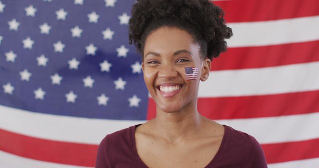 Proud African American Woman Smiling with USA Flag Background - Download Free Stock Photos Pikwizard.com