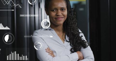 Confident Woman Engineer with Data Interface in Server Room