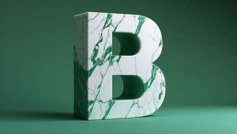Green veined marble letter b on minimalistic green background