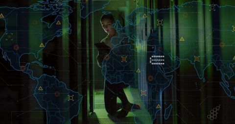 Technician monitoring data center racks with digital map overlay