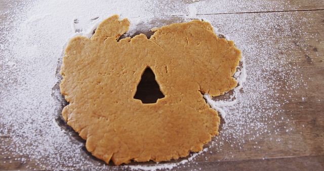 Rolled Dough with Christmas Tree Cookie Cutout on Floured Surface - Download Free Stock Images Pikwizard.com