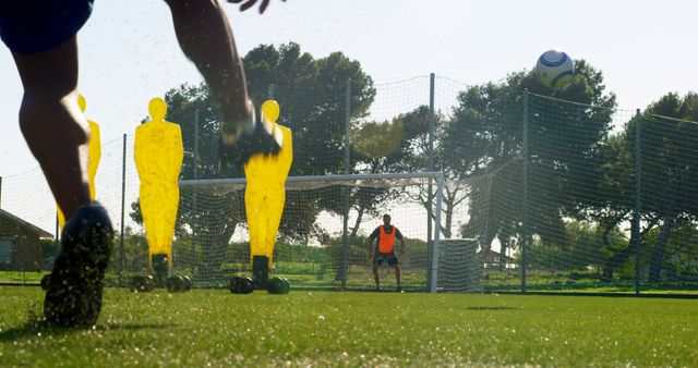 Soccer Player Practicing Free Kicks on Training Field - Download Free Stock Images Pikwizard.com