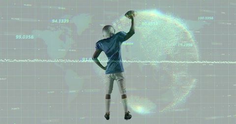 Futuristic football player interacting with digital world