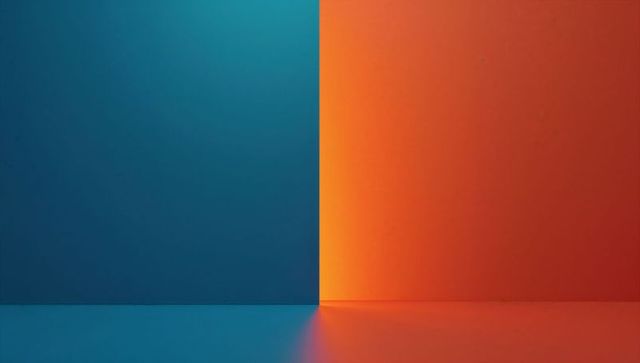 Teal-blue and orange wall contrast against reflective surface