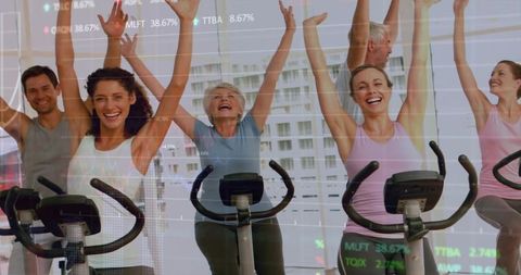 Energetic spin class with stock market overlay insights