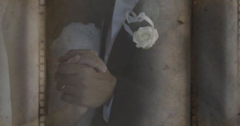 Romantic Embrace of Bride and Groom Dancing in Vintage Film Style