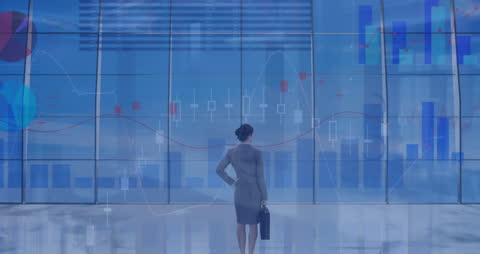 Businesswoman Analyzing Digital Graphs with a Futuristic Display