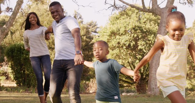 Happy African American Family Playing Together in Park - Download Free Stock Images Pikwizard.com