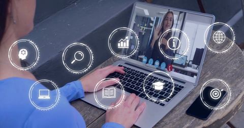 Businesswoman engaged in online video call with digital interface icons