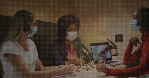 Women Hosting Podcast in Modern Recording Studio Environment