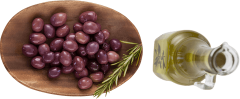 Transparent olives and olive oil with rosemary herbs close-up