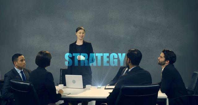 A group of business professionals engaging in a strategy meeting. The leader stands and presents ideas to the team, emphasizing teamwork and collaboration. Ideal for articles or websites focused on business strategies, corporate settings, team dynamics, leadership, and professional meetings.