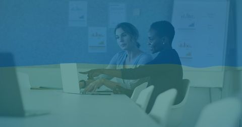 diverse business professionals analyzing financial data with ukrainian overlay - Download Free Stock Images Pikwizard.com