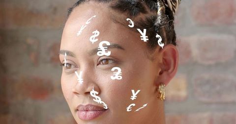Woman contemplating global finance with floating currency symbols, braided hair, headscarf