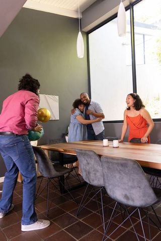 Diverse Family Gathering in Modern Dining Room
