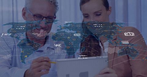 Business professionals analyzing data with global map overlay