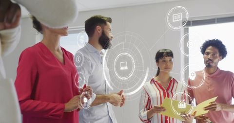 Diverse team collaborating with digital hud during brainstorming and strategy session