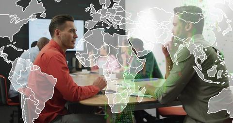 Global Business Collaboration Executives Conversing at Modern Office Table