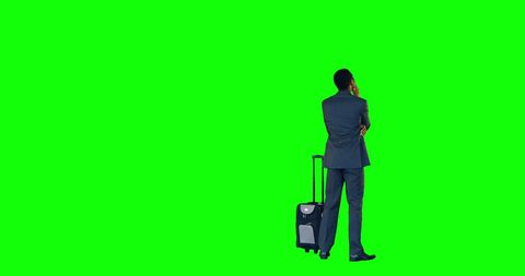 Businessman Pondering with Suitcase on Vibrant Green Background