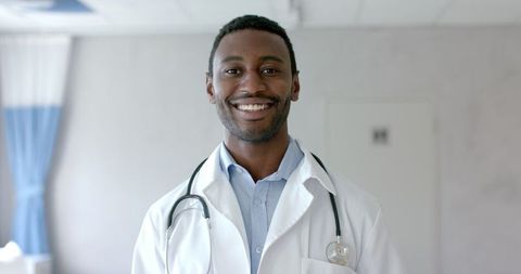 Smiling African American Male Doctor in Hospital Ward