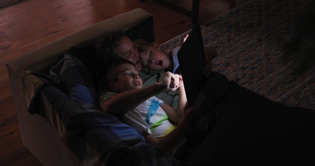 Family Bonding While Watching Movie on Laptop at Night - Download Free Stock Images Pikwizard.com