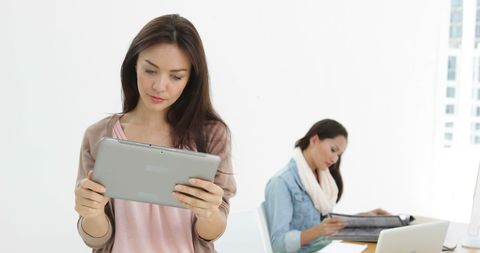 Creative Businesswoman Using Tablet in Design Studio - Download Free Stock Images Pikwizard.com