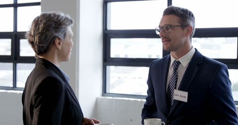 Colleagues Conversing and Having Coffee During Office Break - Download Free Stock Images Pikwizard.com