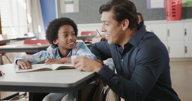 Teacher Encouraging Young Student in Classroom Setting - Download Free Stock Images Pikwizard.com