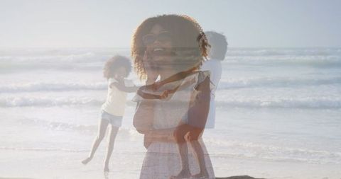 Joyful Mother and Daughter Beach Play