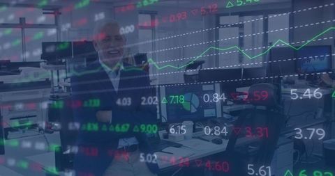 Senior businessman analyzing stock market data in office