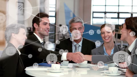 Business Team Shaking Hands in Connected Global Network