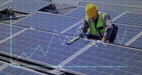 Technician Inspecting Solar Panels on Rooftop with Digital Graph Overlay