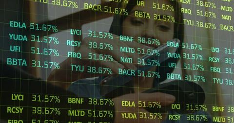 Businesswoman Analyzing Stock Market Data with Digital Interface