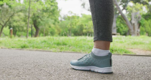 Athletic Woman Exercising in Park Wearing Comfortable Sneakers - Download Free Stock Images Pikwizard.com