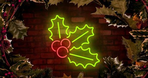Festive Neon Holly Decoration with Brick Wall Background