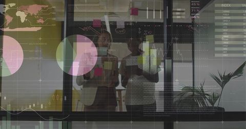 Businesswomen Collaborating with Sticky Notes Beneath Data Overlays