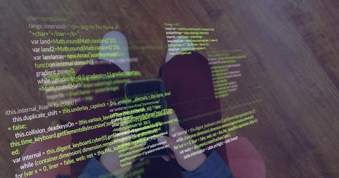 Woman holding smartphone while sitting on floor with glowing holographic code overlay