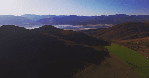 transparent view of majestic mountains under clear blue sky - Download Free Stock Videos Pikwizard.com