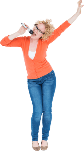 joyful woman singing with microphone in stylish orange outfit on transparent background - Download Free Stock Videos Pikwizard.com