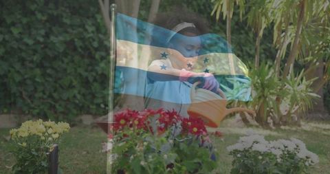 Young Girl Gardening with Honduran Flag Overlay in Sunny Backyard