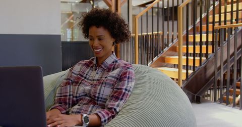 Smiling African American Businesswoman Video Calling in Modern Office - Download Free Stock Images Pikwizard.com