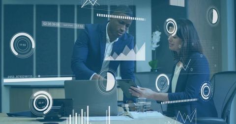 Business Professionals Collaborating with Innovative Data Visuals