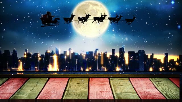 This represents a magical Christmas scene with Santa's sleigh and reindeer silhouetted against a full moon over a glowing metropolis. Snow appears to gently snow fall adds to enchantment of the festive night. Use for holiday promotions, greeting cards, festive websites, or Christmas advertisements.